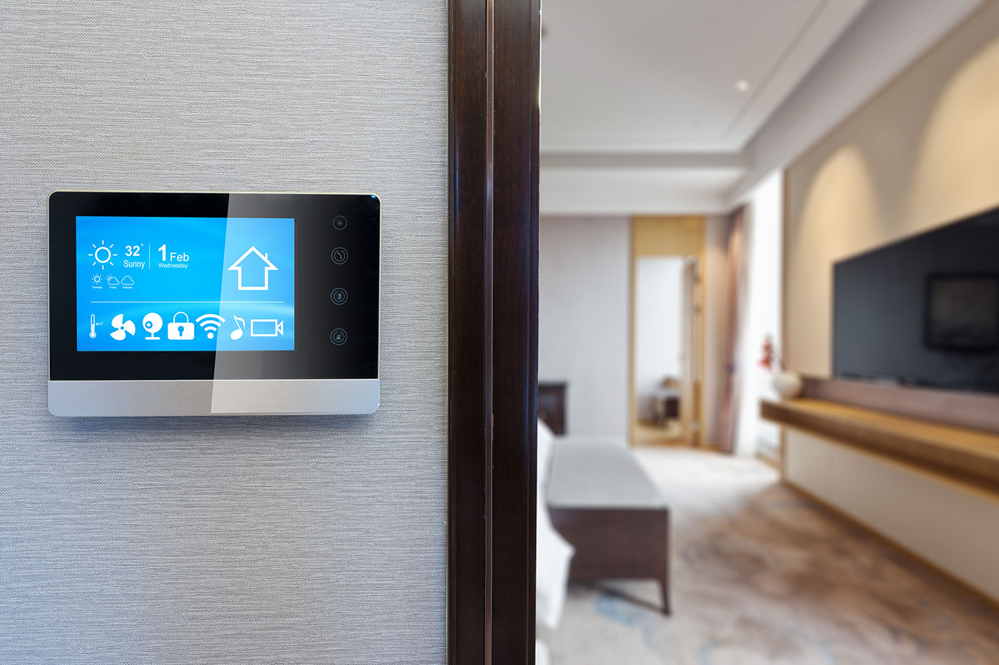 a smart thermostat that has been place on an interior wall of a home